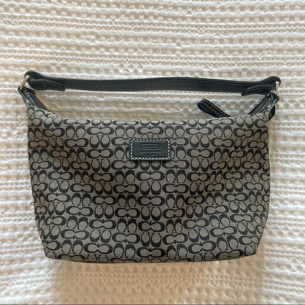 Small coach purse with black signature C’s